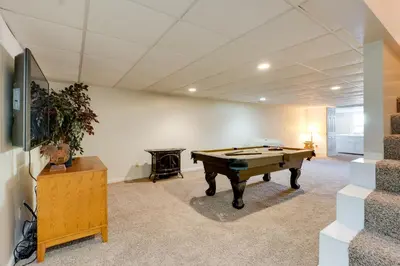 a living room with a pool table in it at Game Room and On-Site Pond Laurelville Retreat! in Laurelville