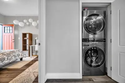 a washer and dryer in a room at Cle Suites 2BR 1BA 5 min Walk to Cle Clinic #14 in Cleveland