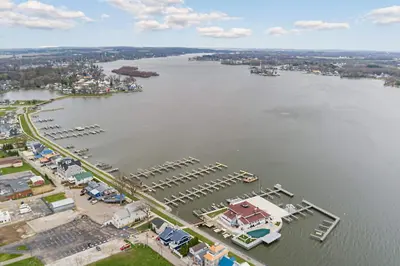 an aerial view of a marina on a river at Modern Lake House 3 Blocks from the Lake! in Buckeye Lake