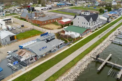 an aerial view of a small town next to a river at Modern Lake House 3 Blocks from the Lake! in Buckeye Lake