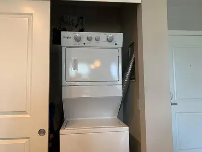 a white oven in a kitchen next to a door at Near Osu Riverside No Steps Garage Parking! in Columbus