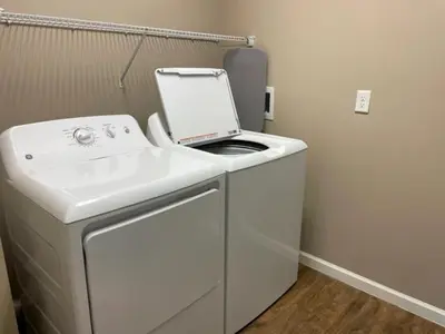 a white washer and dryer in a room at The Hilliard Executive No Steps Luxury Beds in Dublin
