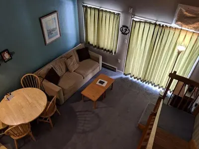 a living room with a couch and a table at The Inn at Dresden in Dresden