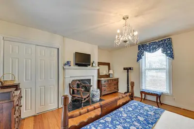 a living room with a couch and a fireplace at Georgetown Home Near Kentucky Horse Park! in Georgetown