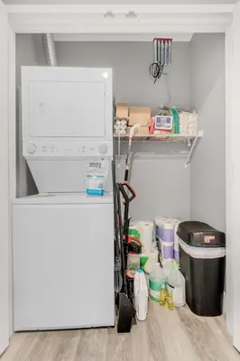 a refrigerator with a shelf and tools in it at Modern 1 Bedroom Apartment with 2 TVs Fast WiFi and Free Parking in Cleveland