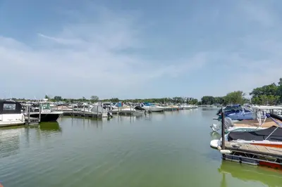 a group of boats docked at a marina at Furnished Screened Porch Baypoint Resort Home! in Marblehead