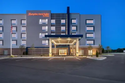 an empty parking lot in front of a hotel at Hampton Inn & Suites By Hilton Port Clinton Catawba Island in Port Clinton