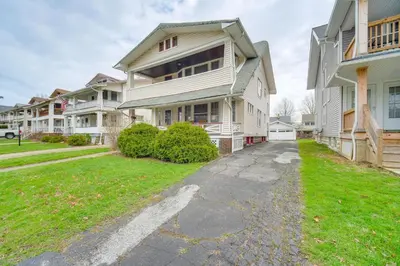 an empty driveway in front of a house at Home 2 Mi to Lakewood Park and Solstice Steps! in Lakewood