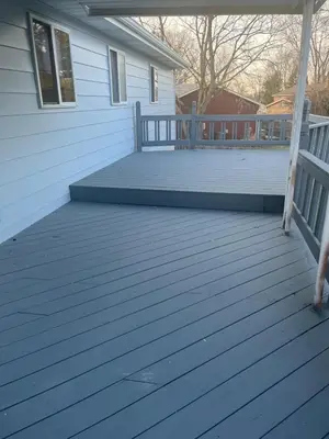 a front porch of a house with a blue deck at Liberty Twp Spacious 4 bedroom house in Middletown