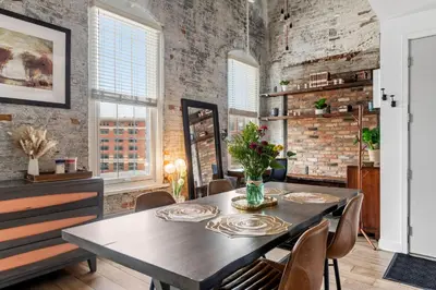 a dining room with a table and chairs at Downtown Free Parking Garage - 5 min walk OTR in Cincinnati