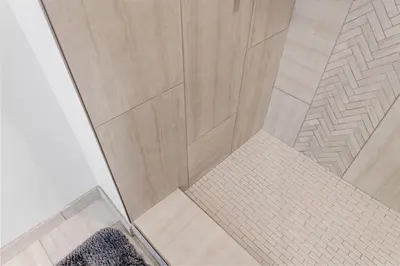 an overhead view of a shower with a wooden floor at Downtown Free Parking Garage - 5 min walk OTR in Cincinnati