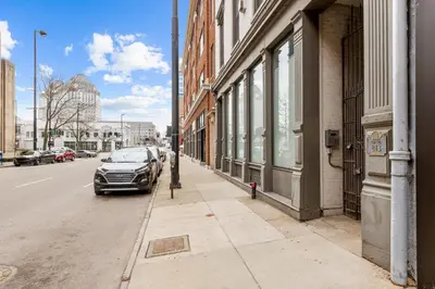 a car parked on the side of a city street at Downtown Free Parking Garage - 5 min walk OTR in Cincinnati