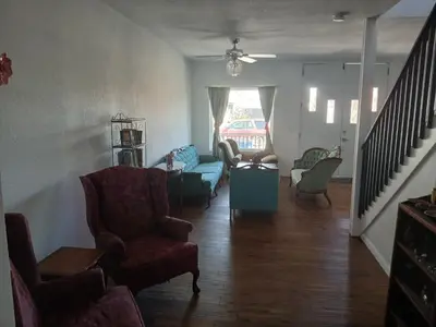 a living room with chairs and a couch at Branson House Bed & Breakfast in Marion