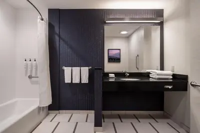a bathroom with a sink and a mirror at Fairfield Inn & Suites by Marriott Akron Fairlawn in Montrose