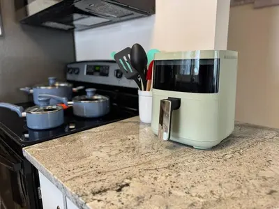 a coffee maker sitting on a counter in a kitchen at Apt Near Oberlin College in Oberlin