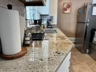 a kitchen counter with a roll of paper towels at Apt Near Oberlin College in Oberlin