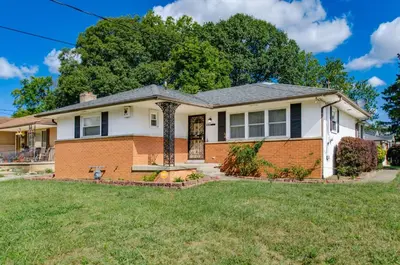 a home with a brick house at Gates getaway in Columbus