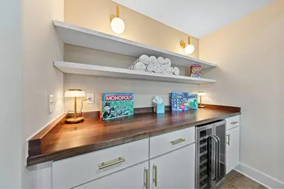 a kitchen with white cabinets and a wooden counter top at Adamina Canyon Luxurious, Canyon View 5BR, 3BTH 1 in Rockbridge
