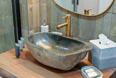 a bathroom with a large metal sink on a counter at Adamina Canyon Luxurious, Canyon View 5BR 3BTH 3 in Rockbridge