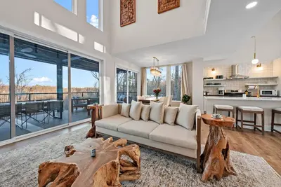 a living room with a couch and a table at Adamina Canyon Luxurious, Canyon View 5BR 3BTH 3 in Rockbridge