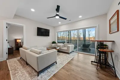a living room with white furniture and a large window at Adamina Canyon Luxurious, Canyon View 5BR 3BTH- 6 in Rockbridge