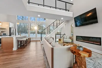 a large living room with a couch and a table at Adamina Canyon Luxurious, Brand New 5BR 3BTH 7 in Rockbridge