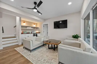 a living room with white furniture and a tv at Adamina Canyon Luxurious, Canyon View 5BR 3BTH 8 in Rockbridge