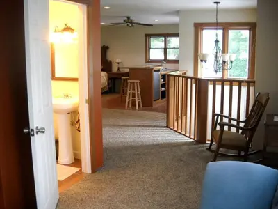 a living room with a kitchen and a dining room at Peaceful Getaway on a Lovely Farm near Hillsboro, Ohio