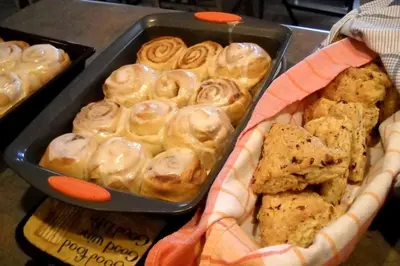 a tray of pastries and a basket of cookies at Romantic Room Rental on a Lovely Farm near Hillsboro, Ohio