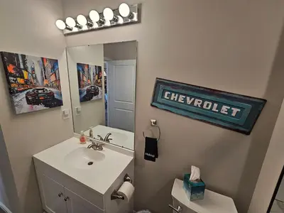 a bathroom with a sink and a mirror at Vroooom . . . . the ROAD is calling. . . . in Trenton