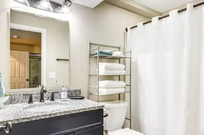 a bathroom with a sink and a toilet and a shower at 8 Mi to Ark Encounter Family Home with Deck and Grill in Dry Ridge