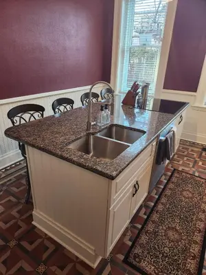 a kitchen with a sink and a counter top at Schwartz Castle in Columbus