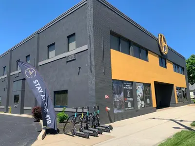 a group of bikes parked outside of a building at The 419 Ten-Room Boutique in Sandusky in Sandusky