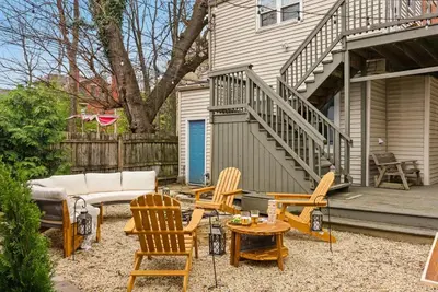 a backyard with chairs and a couch and a table at Walk to OSU & Short North FREE PARKING Fire Pit in Columbus