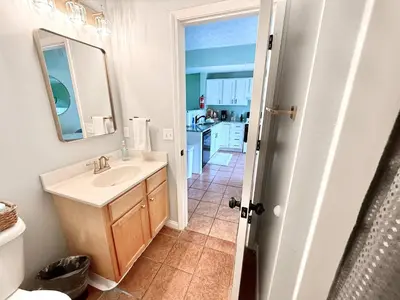 a bathroom with a sink and a mirror at 4 apartments 10 bedrooms - 2 and a half Miles from Ark in Williamstown