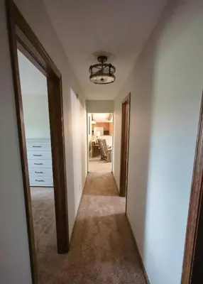 a hallway leading to a room with the ocean at Sherwood Forest Park- 6BD/3BA on Private Ohio Land in North Lawrence
