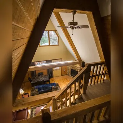 an overhead view of a living room with a ceiling at A-Frame #11 - by The Chalets in Logan