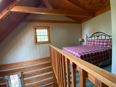 a bedroom with a bed in a attic at Aspen - by The Chalets in Logan