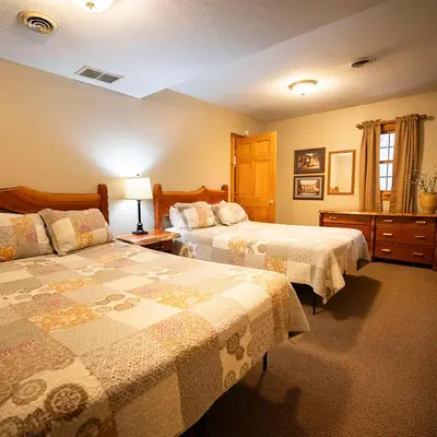 a hotel room with two beds and a window at Blackjack - by The Chalets in Logan