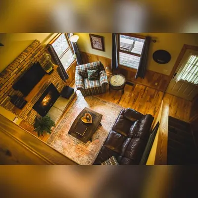 an overhead view of a living room with a couch at Couples Paradise II - by The Chalets in Logan