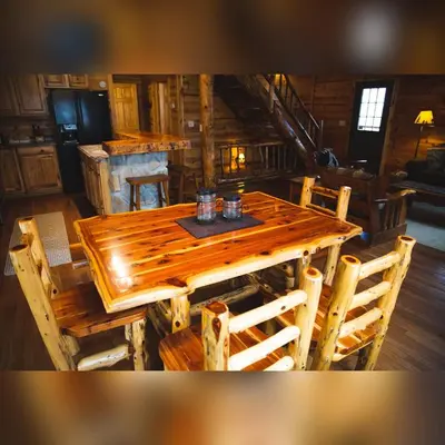 an overhead view of a wooden table in a cabin at Hidden Heights - by The Chalets in South Bloomingville