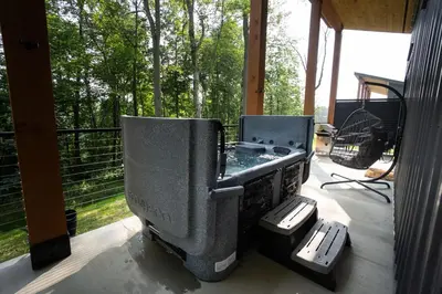 a large grill on a screened in porch at Legends Lane B - by The Chalets in Logan