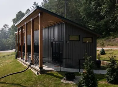 a small house with a porch and a porch at Legends Lane C - by The Chalets in Logan
