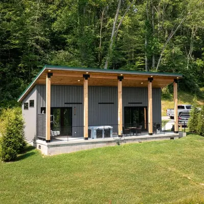 a house with a porch with columns at Legends Lane D - by The Chalets in Logan