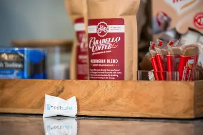 a wooden counter top with a box of red pencils at 3BR Condo for 7 - Only 3 Miles to Ark Encounter! in Williamstown