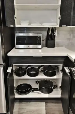 a kitchen with a stove with pots and pans at The Buckeye's Gem Near Downtown & OSU in Columbus
