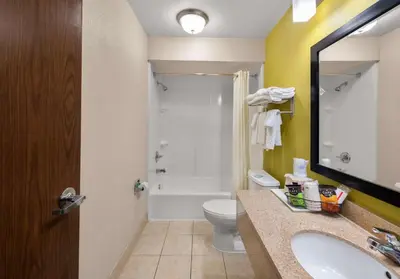 a bathroom with a sink and a toilet and a shower at Best Western Adena Inn in Chillicothe