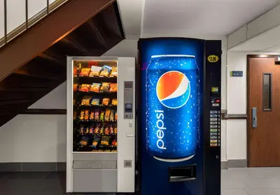 a vending machine with a pepsi cola cooler at Best Western Adena Inn in Chillicothe