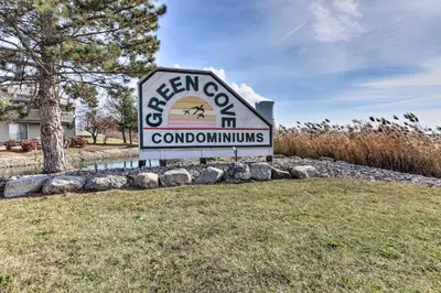 a sign for a farmocordiths sign in a yard at Boat Slip and Pool Access Oak Harbor Haven! in Oak Harbor