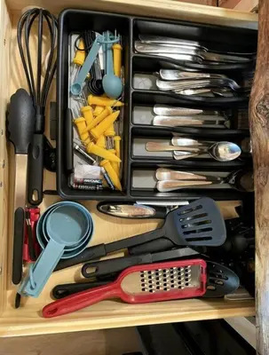 a drawer filled with lots of cooking utensils at Modern Spacious Cabin near Tappan Lake with Jacuzzi and Panoramic Views in Ohio in Deersville